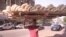Sameh Soltan, a bread vendor: In Egyptian Arabic, &ldquo;bread&rdquo; and &ldquo;life&rdquo; are the same word. &ldquo;I feel bad for the customers because prices are going up.&quot; Soltan sells bread in the Cairo suburbs. He learned how to balance the bread on his head from his brother and they carry the bread without vehicles because the cost of transportation would further raise prices in their already poor community. &ldquo;It looks like I work in circus and it&#39;s fun. But no it&#39;s really tiring job. Everyday I go back home sleep like I&rsquo;m dead.&quot;