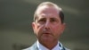 FILE - Health and Human Services Secretary Alex Azar speaks with reporters after a meeting about vaping with President Donald Trump in the Oval Office of the White House in Washington, Sept. 11, 2019. 