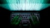 FILE - A man types on a computer keyboard in this illustration, Feb. 28, 2013. A U.S.-based cybersecurity intelligence group says that it has seen Iranian state hackers using more ransomware.