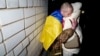 Scores of Ukrainian and Russian prisoners head back home after swap 