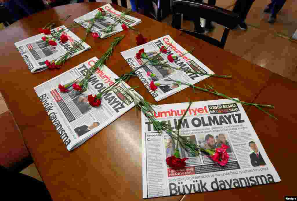 Carnations and today&#39;s copies are seen in the newsroom of Cumhuriyet newspaper, an opposition secularist daily, in Istanbul, Turkey.
