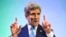 FILE - U.S. Secretary of State John Kerry gestures while speaking about climate change in Jakarta, Feb. 16, 2014.