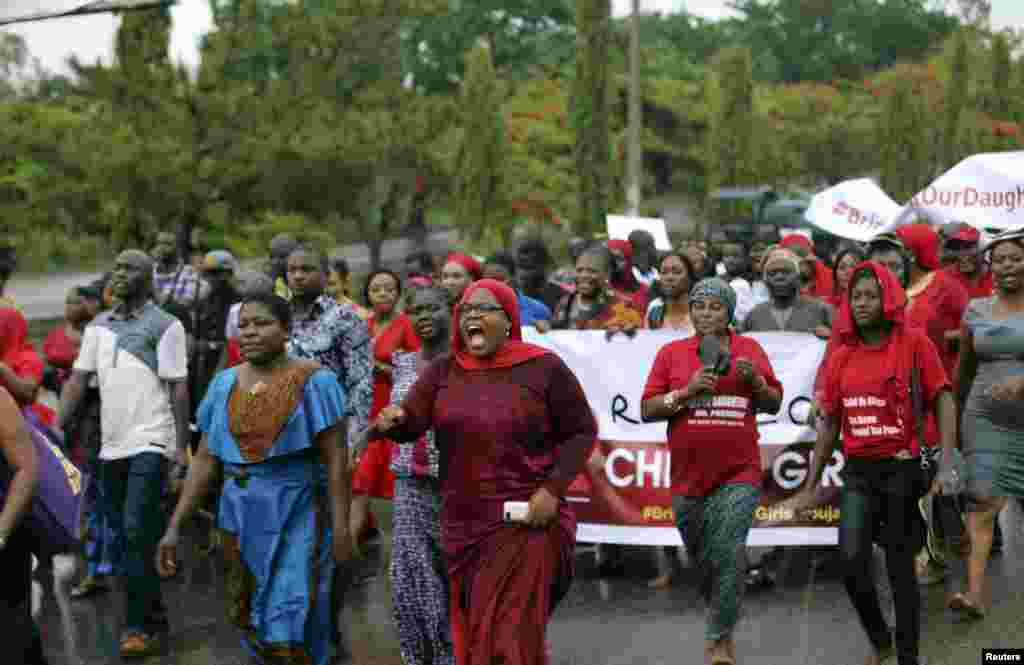 Members of various civil society organisations (CSOs) protest against the delay in securing the release of the abducted schoolgirls who were kidnapped, in Abuja April 30, 2014. Dozens of protesters gathered outside Nigeria's parliament on Wednesday called
