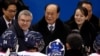 FILE - IOC president Thomas Bach, second from left, and Kim Yo Jong, right, sister of North Korean Leader Kim Jong Un.