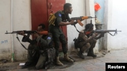 FILE - Somali security forces hold their positions near the mayor's office following a blast in Mogadishu, Somalia, on Jan. 22, 2023. The Somali government claimed on Oct. 4, 2023, that its troops had killed hundreds of al-Shabab militants in the past two months.