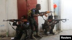 FILE - Somali security forces hold their positions near the mayor's office following a blast in Mogadishu, Somalia, Jan. 22, 2023. The government claimed that new clashes in southern Jubaland state have killed 135 al-Shabab militants.