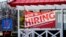 A hiring sign shows outside of restaurant in Prospect Heights, Illinois, March 21, 2021.