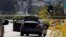 A car, allegedly used by the gunman who killed one at the Congregation Chabad synagogue in Poway, is pictured, a few hundred feet from the Interstate 15 off-ramp north of San Diego, California, April 27, 2019.