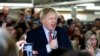 Britain's Prime Minister Boris Johnson delivers a speech during a meeting with workers as he visits John Smedley Mill in Matlock, Derbyshire, Britain, Dec. 5, 2019.