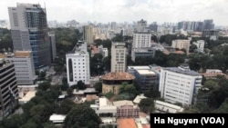 越南拥有世界上最高的经济增长率之一, 胡志明市的天际线正在迅速发生变化。（2018年10月10日）