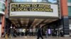 A sign calling on people to abide by government restrictions amid the spread of the coronavirus pandemic is seen in Manchester, Britain, Oct. 7, 2020. 
