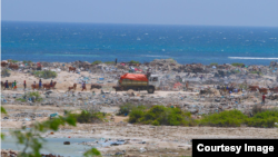 A truck prepares to dump trash at Jazeera Beach, one of the most popular beaches in Somalia's capital, Mogadishu. (Courtesy - Jamal Ali)