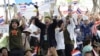 Supporters of the judges react to the Constitution Court ruling outside the court in Bangkok, Thailand, July 13, 2012. 
