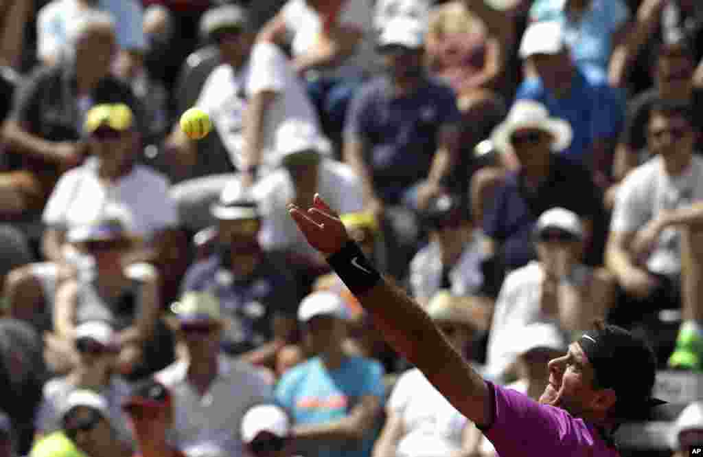 Argentina&#39;s Juan Martin Del Potro serves the ball to Britain&#39;s Kyle Edmund during their match at the Italian Open tennis tournament, in Rome.