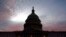 The U.S. Capitol is seen at sunset, Jan. 5, 2022, in Washington. Thursday marks the first anniversary of the Capitol insurrection, a violent attack that has fundamentally changed Congress and prompted widespread concerns about the future of American democracy.