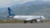 Avion Montenegro erlajnsa na pisti u Podgorici, 12. juna 2020. (Foto: RFE/RL)