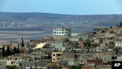 库尔德武装和伊斯兰国激进分子争夺的科巴尼城