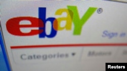 FILE - A photograph of a computer screen showing the website eBay in Encinitas, California.