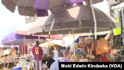 People buy and sell their goods in Ekok, a Cameroonian village on the southwestern border with Nigeria.