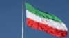 FILE - The Iranian flag is seen flying over a street in Tehran, Iran, February 3, 2023. Majid Asgaripour/WANA (West Asia News Agency) 