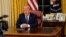 President Donald Trump speaks about the U.S response to the COVID-19 coronavirus pandemic during an address to the nation from the Oval Office of the White House in Washington, March 11, 2020.