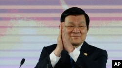 在马尼拉出席亚太经合组织会议的越南国家主席张晋创（2015年11月17日）