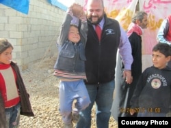 Mohamed Khairullah visits Atmah refugee camp in 2012. (Courtesy of Mohamed Khairullah)