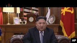 Shugaba Kim Jong Un a wani hoton bidiyo da ba ambaci ranar da aka dauka ba, yana jawabi