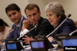 British Prime Minister Theresa May speaks during a session on girls' education on the sidelines of the General Assembly at U.N. headquarters in New York, Sept. 25, 2018.