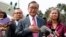 Cambodia's exiled opposition leader Sam Rainsy talks to the media outside Parliament House in Kuala Lumpur, Malaysia, Tuesday, Nov. 12, 2019. 