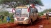FILE - Kenyan security forces and others gather around the scene on an attack on a bus in November 2014 in northeastern Kenya.