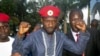 Ugandan pop star and opposition figure Bobi Wine, whose real name is Kyagulanyi Ssentamu, greets his followers as he arrives home after being released from prison on bail in Kampala, Uganda, May 2, 2019. 
