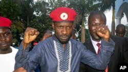Ugandan pop star and opposition figure Bobi Wine, whose real name is Kyagulanyi Ssentamu, greets his followers as he arrives home after being released from prison on bail in Kampala, Uganda, May 2, 2019. 