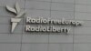 FILE - A sign for Radio Free Europe/Radio Liberty (RFE/RL) is pictured on the broadcaster's headquarters building, in Prague, Czech Republic, May 12, 2009. 