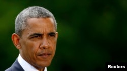 Presiden AS Barack Obama memberikan keterangan mengenai situasi di Irak dari Gedung Putih (13/6). (Reuters/Kevin Lamarque)