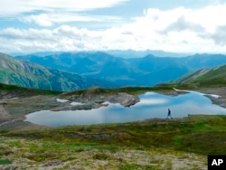 FILE -- A hiker on the Juneau ridge in Juneau, Alaska, a state many home buyers left in 2018 in favor of Washington State.