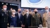 From second left, U.S. Deputy Secretary of State Wendy Sherman, NATO Secretary General Jens Stoltenberg, Russia's Deputy Foreign Minister Alexander Grushko, and Deputy Defense Minister Alexander Fomin pose for a photo prior to their meeting in Brussels, Belgium, Jan. 12, 2022.