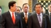 Vietnam's Prime Minister Nguyen Tan Dung (L) and his Cambodian couunterpart Hun Sen (R) talk as they walk to their lunch during the ASEAN Summit at the Prime Minister's Office in Bandar Seri Begawan, April 25, 2013.