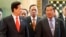 Vietnam's Prime Minister Nguyen Tan Dung (L) and his Cambodian couunterpart Hun Sen (R) talk as they walk to their lunch during the ASEAN Summit at the Prime Minister's Office in Bandar Seri Begawan, April 25, 2013.