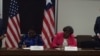 US Assistant Secretary for African Affairs Linda Thomas Greenfield and Liberian Foreign Minister Marjon Kamara sign a statement on US-Liberia cooperation.