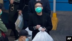 谭得志（中）资料照片