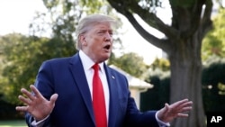 唐纳德·特朗普总统在白宫南草坪上接受记者采访。2019年9月16日