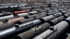 With the world awash in oil, tank train cars sit idle on April 21, 2020, in East Chicago.