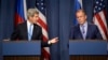 U.S. Secretary of State John Kerry (L) and Russian Foreign minister Sergey Lavrov (R) give a press conference in Geneva following their meeting on Syria's chemical weapons, Sept. 12, 2013.