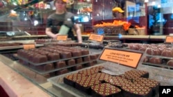 Chocolate displayed at New York City chocolate shop. (AP Photo/Beth J. Harpaz)