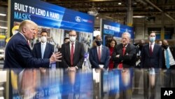 President Donald Trump speaks as he tours Ford's Rawsonville Components Plant that has been converted to making personal protection and medical equipment, May 21, 2020, in Ypsilanti, Mich.