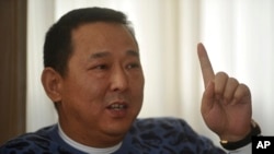 前汉龙集团董事长、四川富豪刘汉（2011年1月16日资料照）