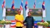 In this photo released by the Government Spokesman's Office, Thailand's Prime Minister Prayuth Chan-ocha (L) shakes hand with Cambodian's Prime Minister Hun Sen at the Thai-Cambodian border town of Aranyaprathet, Thailand, April 22, 2019.