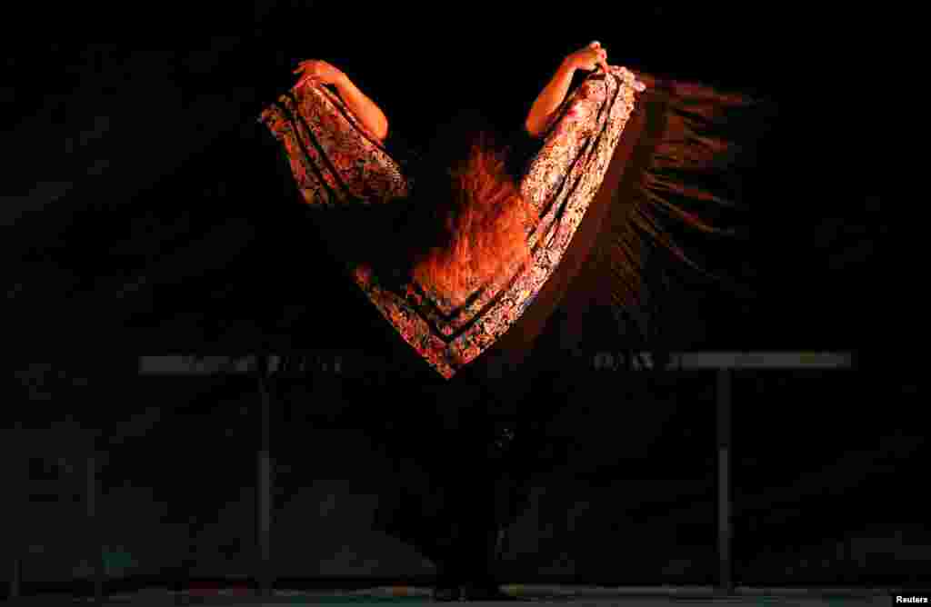 Flamenco dancer Rocio Molina performs during a rehearsal of her work &quot;Grito Pelao&quot; as part of the Bienal of Flamenco in Seville, Spain. The Bienal is the world&#39;s largest Flamenco festival and will run until September 30.