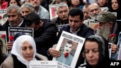Selahattin Demirtas (C), co-leader of Turkey's pro-Kurdish Peoples' Democratic Party (HDP), attends a gathering of "Saturday Mothers" at Galata Sarai Square in Istanbul